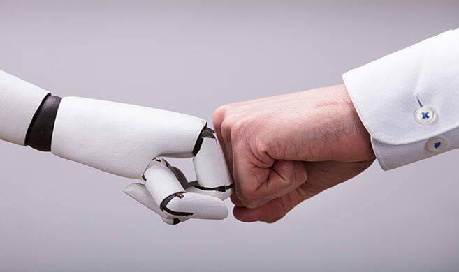 robot and human hands together