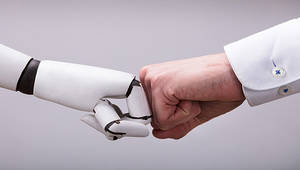 robot and human hands team vignette