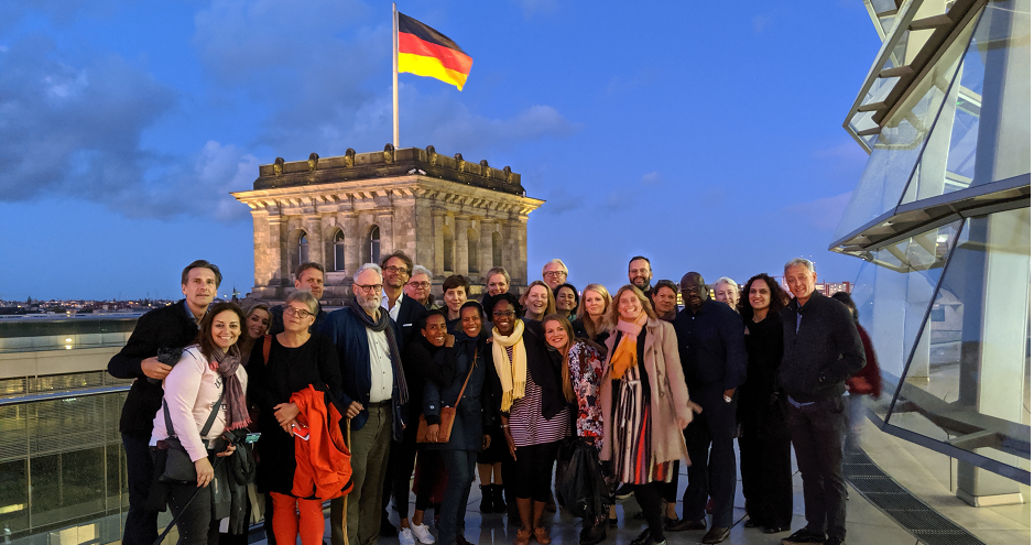 Exed participants in from of Berlin Parliament