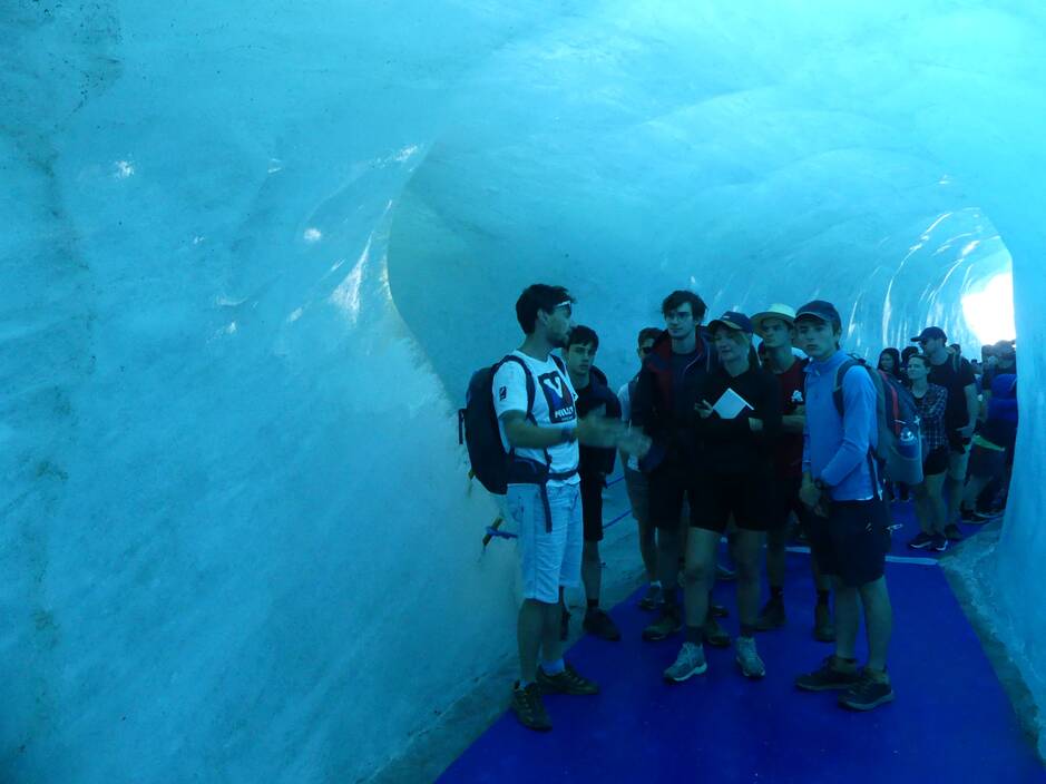 HEC Paris young students discovering an icecave in Mont-Blanc